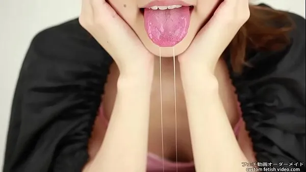 شاهد Saliva fetish A woman showing a tongue and saliva إجمالي مقاطع الفيديو
